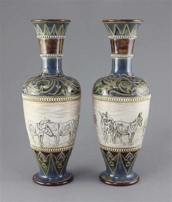 Hannah Barlow for Doulton Lambeth. A pair of sgraffito vases, circa 1895, height 31.3cm